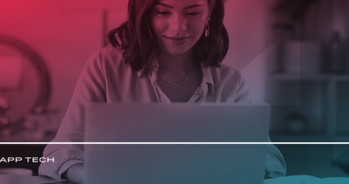 a woman sitting in front of a laptop with app tech written on the bottom