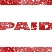 the word paid is written in red on a black background